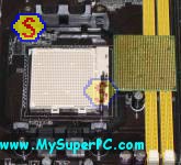 How To Assemble A Computer - PC Assembly Guide, ASUS M2N32-SLI Deluxe Wireless Edition Motherboard Processor Socket With AM2 Athlon 64 X2 Processor