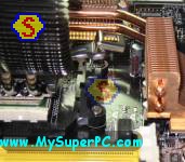 How To Assemble A Computer - PC Assembly Guide, Zalman CNPS 9500 AM2 CPU Cooler Clipped On Athlon 64 X2 Processor