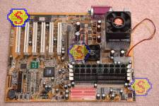 How To Assemble A Computer - PC Assembly Guide, ABIT KR7A-133 motherboard with processor, CPU cooler and two PC2100 memory modules installed